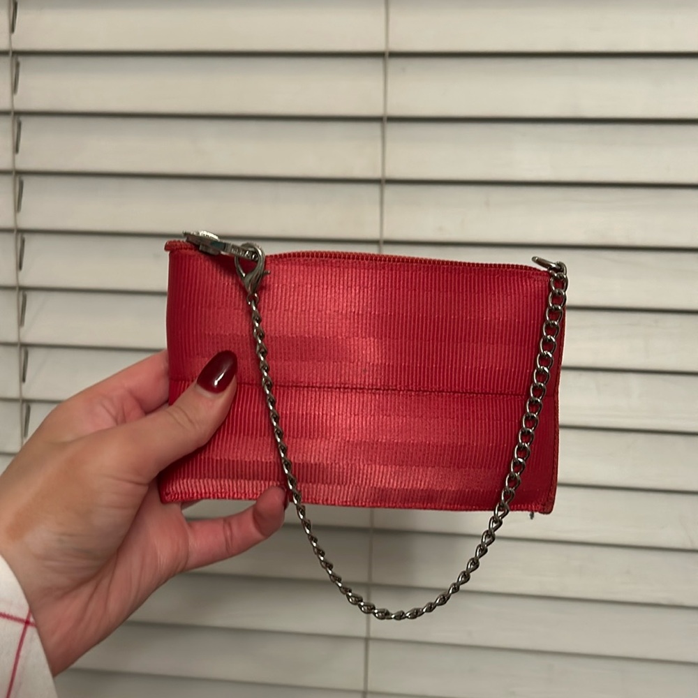 Harvey’s red wallet/wristlet with silver chain